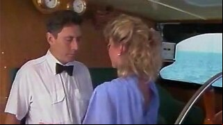 Witness the seductive and wild Candie Evans as she indulges in oral pleasures on a boat. This vintage blonde bombshell will leave you craving for more.